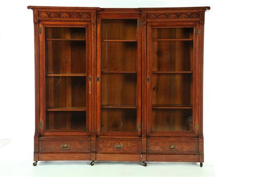 Appraisal: VICTORIAN RENAISSANCE REVIVAL THREE-PART BOOKCASE American late th century walnut