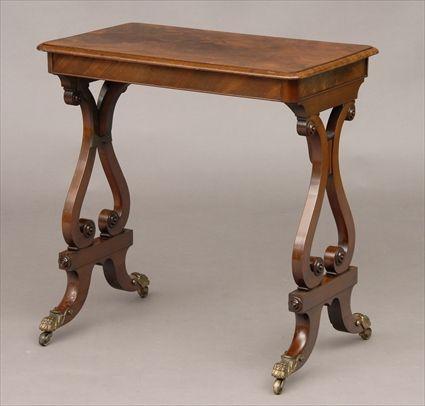 Appraisal: WILLIAM IV MAHOGANY OCCASIONAL TABLE The molded top on lyre-form