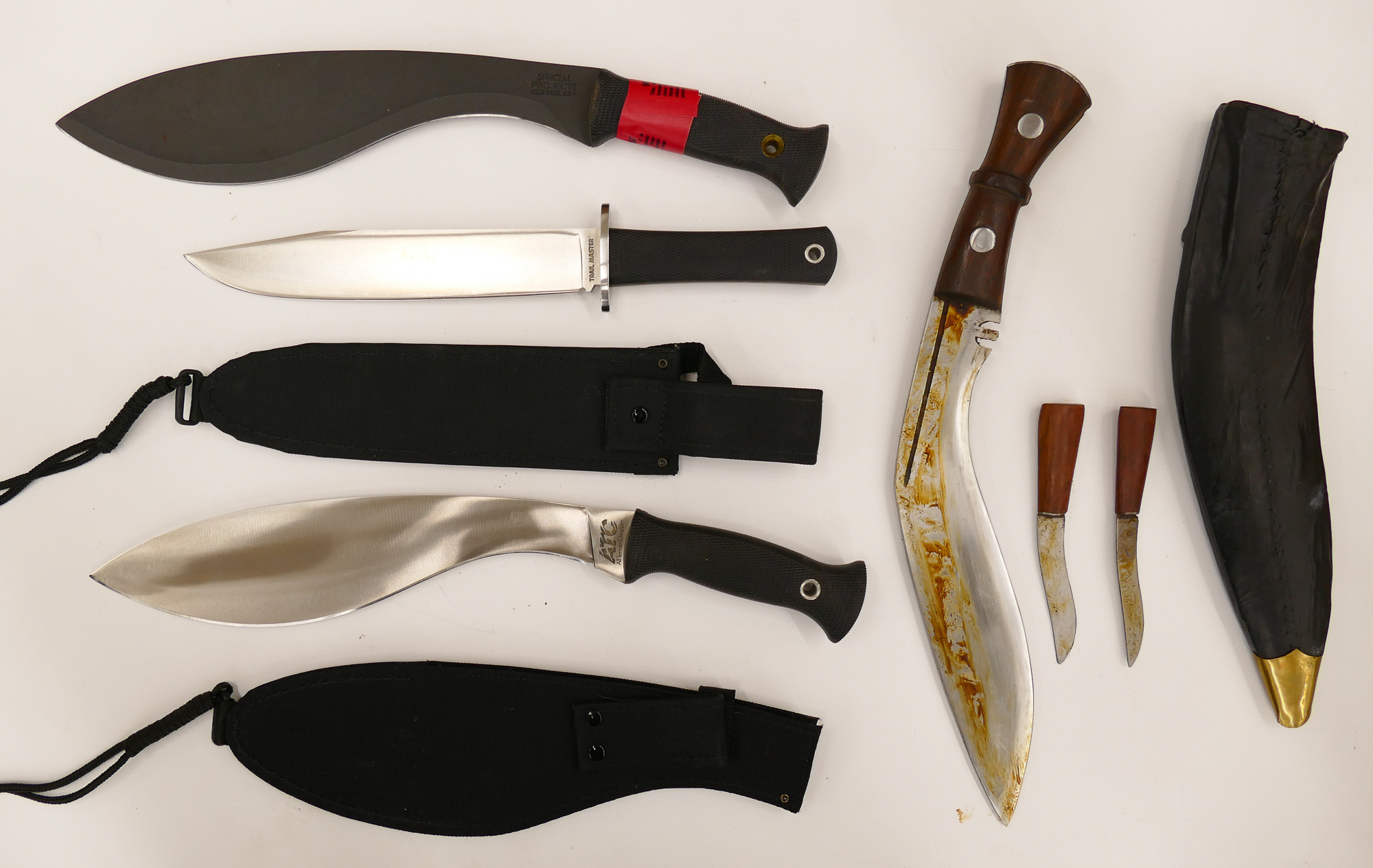 Appraisal: pc Hunting Survival Knives Includes pc Kukri style Knives from