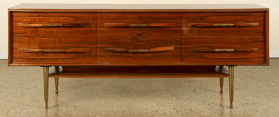 Appraisal: WALNUT DRESSER IN THE MANNER OF ROBSJOHN GIBBINGS A six