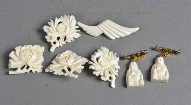 Appraisal: Chinese Carved Ivory PendantsFinely carved to include Buddha's lotus blossoms