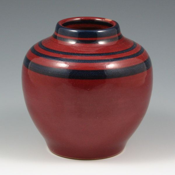 Appraisal: UND School of Mines high glaze vase in maroon with