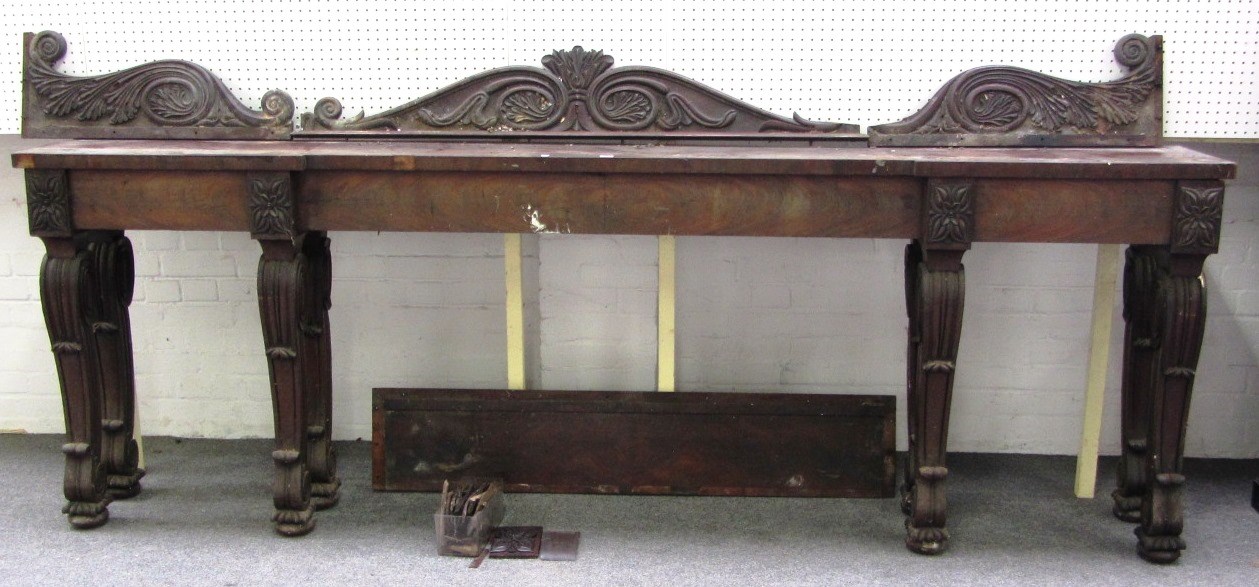 Appraisal: An early th century mahogany console table with acanthus scroll