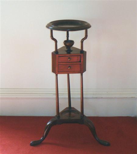 Appraisal: A th century mahogany wig stand the moulded circular top