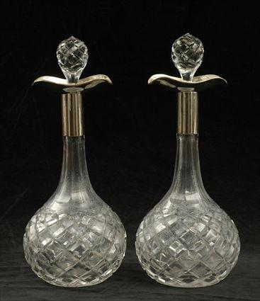 Appraisal: Pair of Silverplate-Mounted Cut Glass Decanters Each in