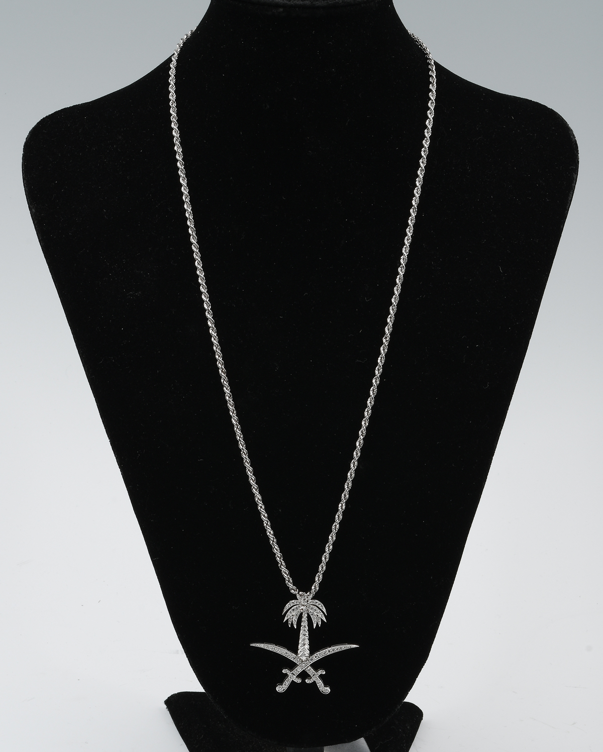 Appraisal: K CTW DIAMOND PALM TREE WITH CROSSED SWORDS PENDANT NECKLACE