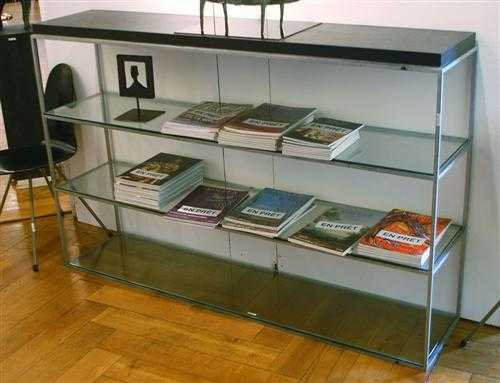 Appraisal: SWISS BOOKCASE circa Painted metal and ebonized wood with glass