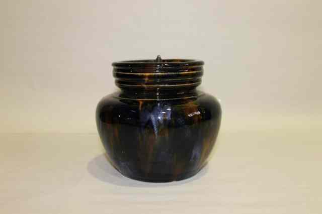 Appraisal: A STONEWARE TOBACCO JAR with coloured glaze