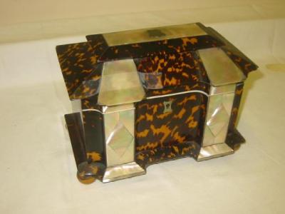 Appraisal: A MOTHER OF PEARL AND TORTOISESHELL TEA CADDY of shaped