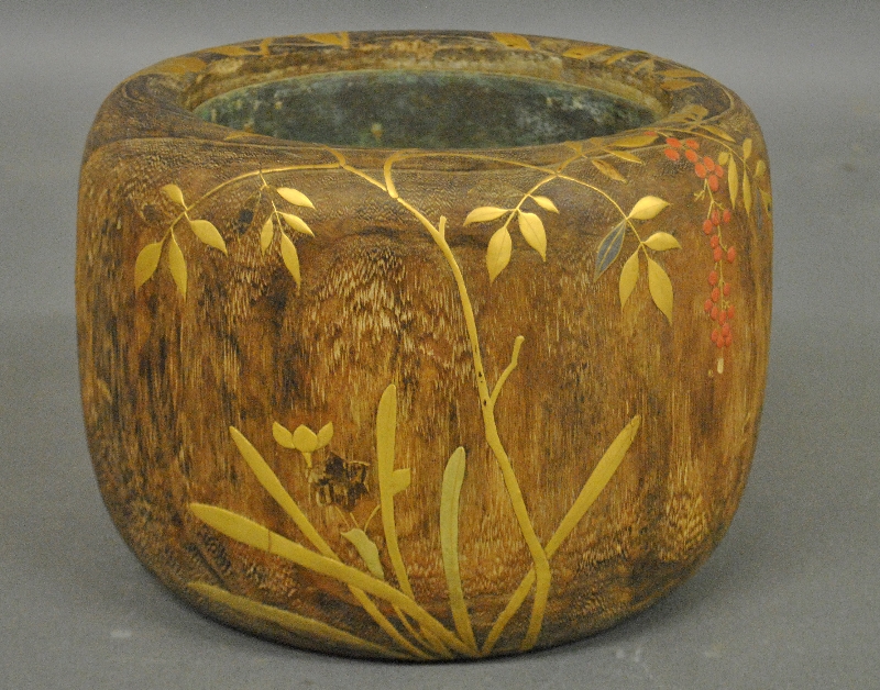 Appraisal: - Asian carved wood planter with a brass insert h