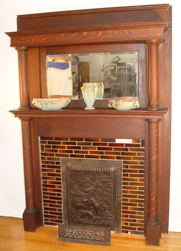 Appraisal: TIGER OAK FIREPLACE MANTLE AND CAST IRON INSERT Columns support