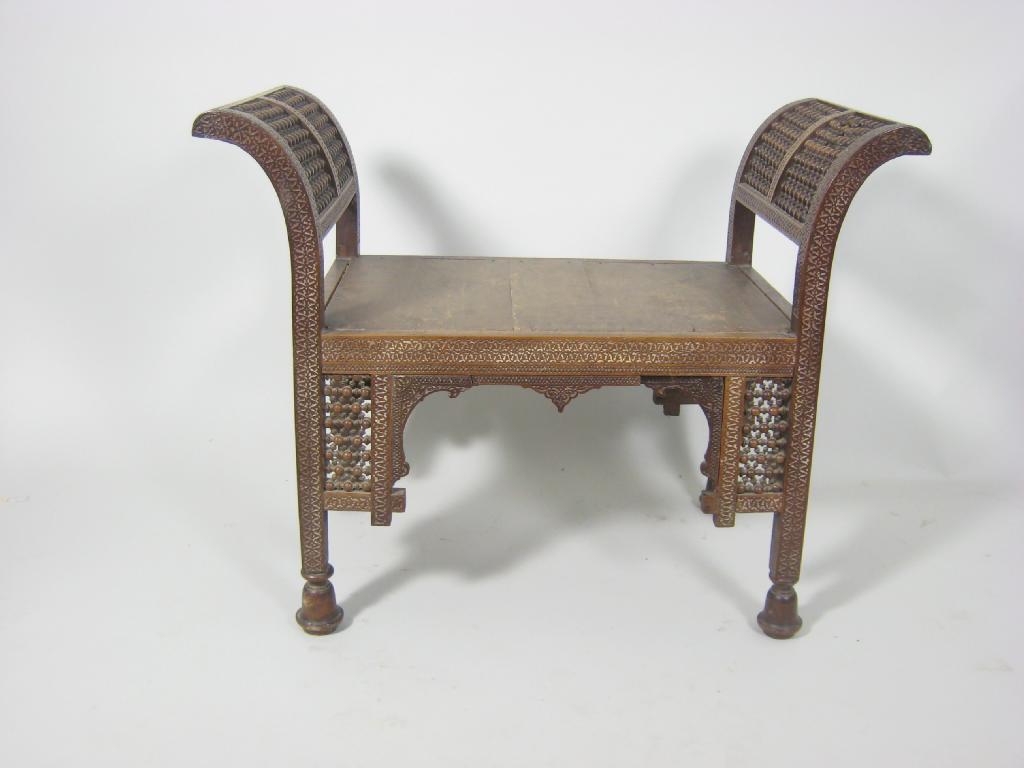 Appraisal: A Moorish Window Seat having carved and pierced decoration to