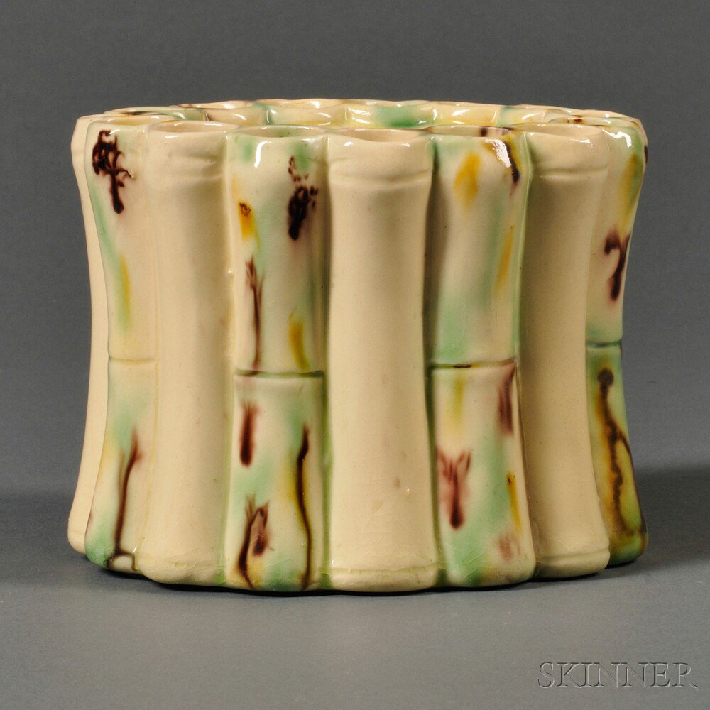 Appraisal: Staffordshire Cream-colored Earthenware Bough Pot England c oval bamboo cluster