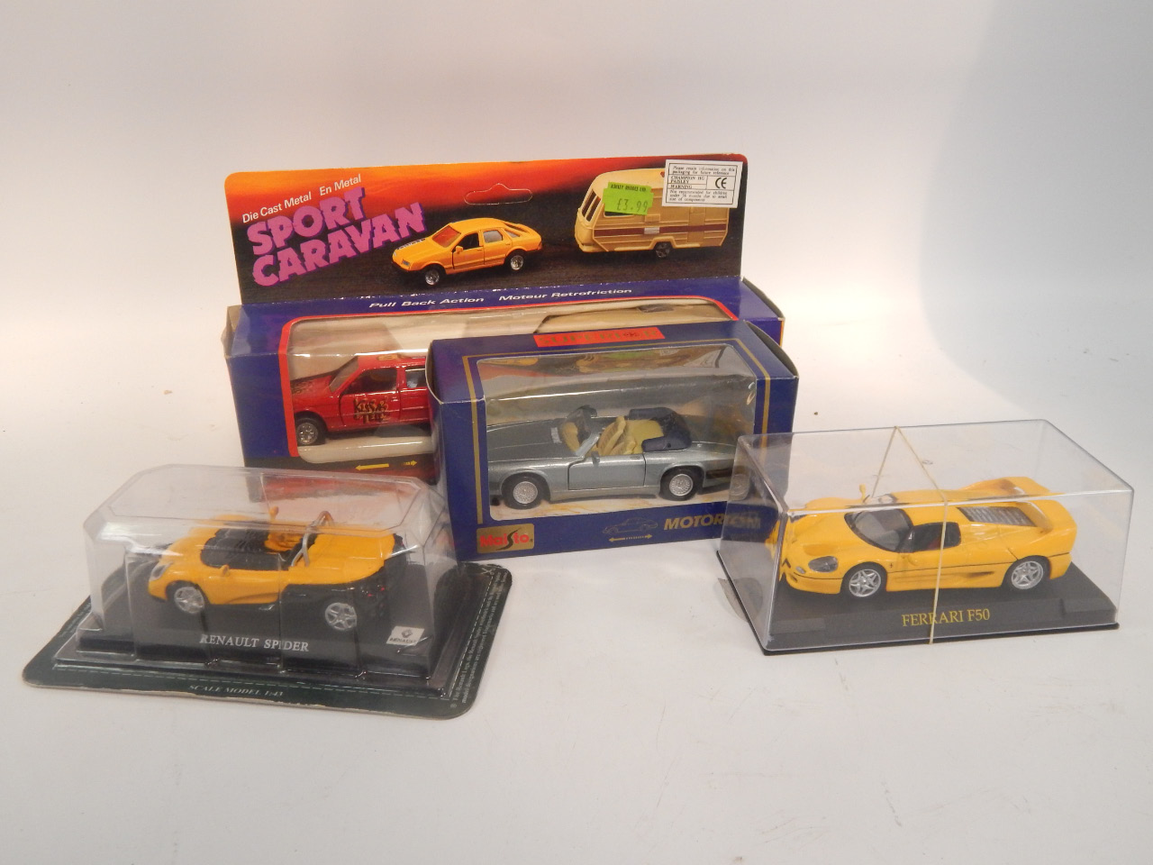 Appraisal: Various die cast vehicles to include Classic Sports Car Collection