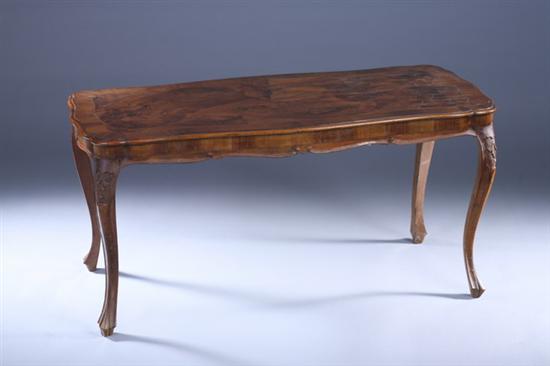 Appraisal: CONTINENTAL CERCASIAN WALNUT LOW TABLE Late th century Early th