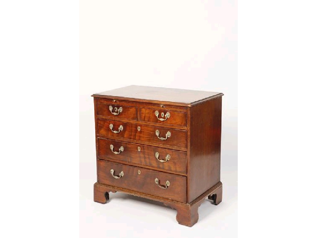 Appraisal: A GEORGE III MAHOGANY CHEST OF DRAWERS the rectangular top