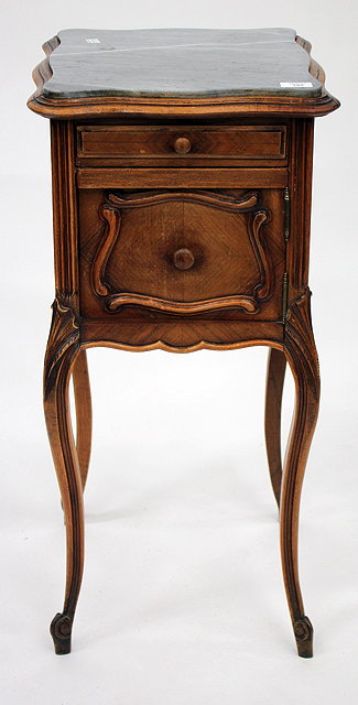 Appraisal: AN EARLY TH CENTURY FRENCH WALNUT AND MARBLE TOPPED BEDSIDE