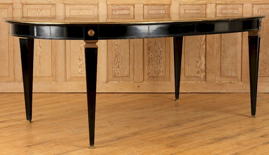 Appraisal: OVAL EBONIZED MAHOGANY JANSEN DINING TABLE C An oval ebonized