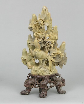 Appraisal: A Carved Hardstone Bird and Flower Figural on Stand A