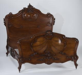 Appraisal: th c French Rococo style carved walnut bed French Rococo