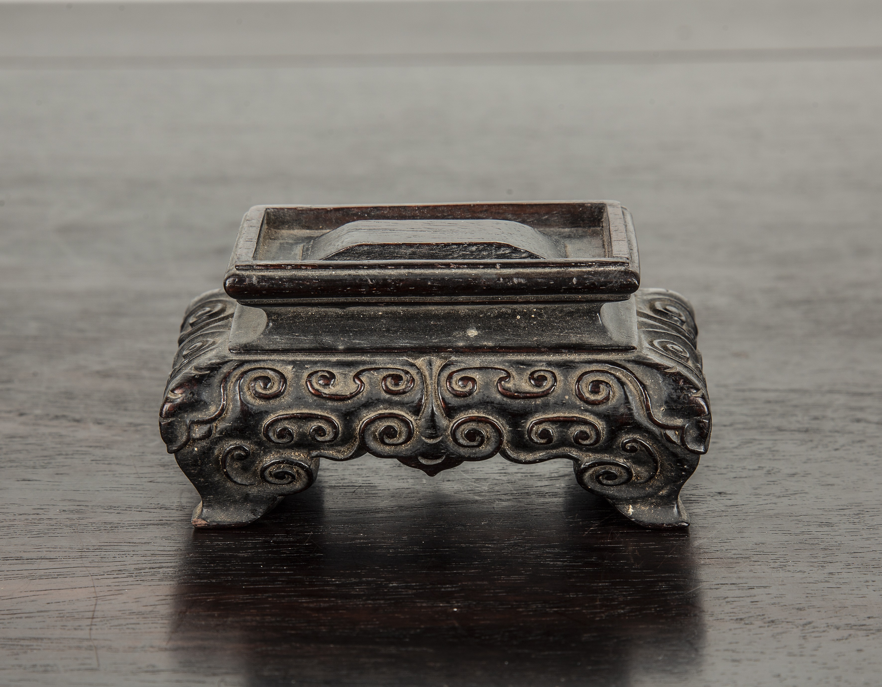 Appraisal: Small zitan stand Chinese th Century of imperial quality carved