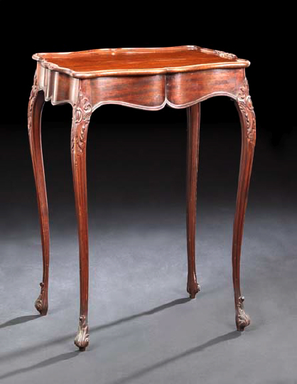 Appraisal: Edwardian Parcel-Gilt Mahogany Occasional Table ca in the French Chippendale