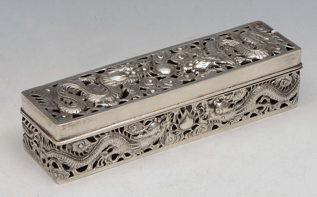 Appraisal: A CHINESE SILVER LIDDED BOX of rectangular form with pierced