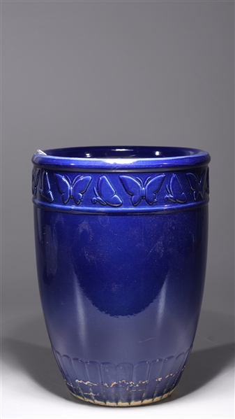 Appraisal: Chinese blue glazed porcelain planter with molded butterflies to rim