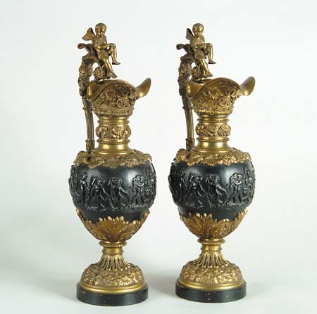 Appraisal: OUTSTANDING PAIR OF CAST IRON AND BRONZE CLASSICAL EWERS A