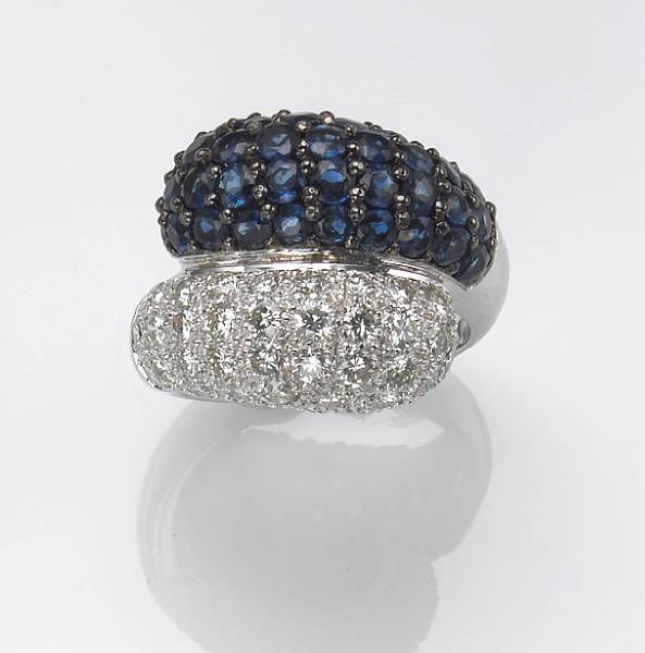 Appraisal: A diamond sapphire and k white gold ring estimated total