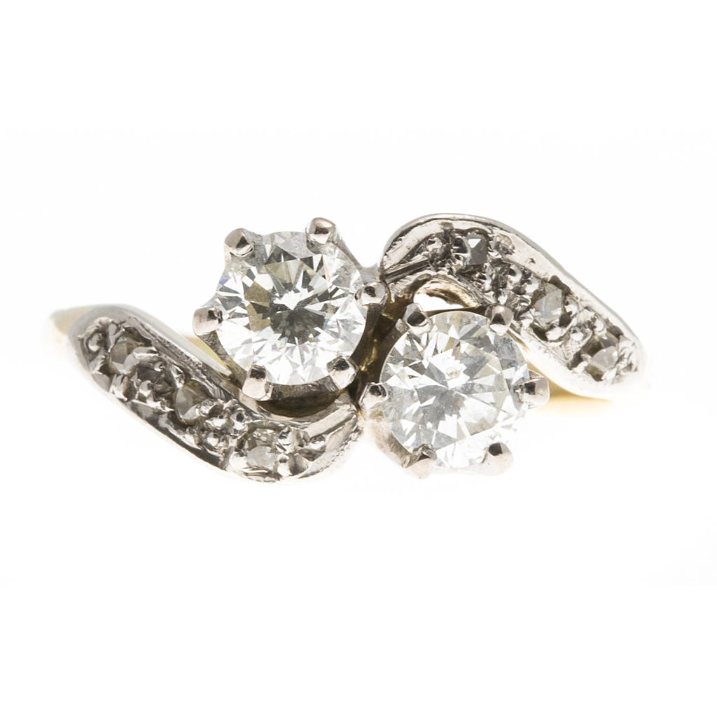 Appraisal: A two stone diamond ring claw set with two round