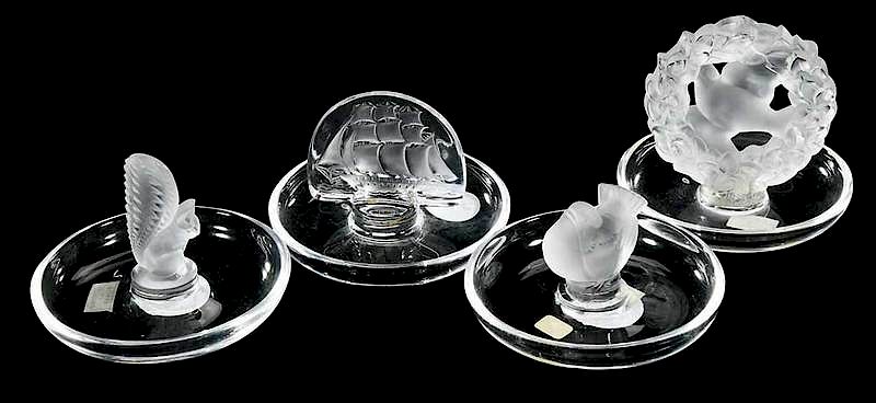 Appraisal: Four Lalique Glass Ashtrays each engraved Lalique France comprising frosted