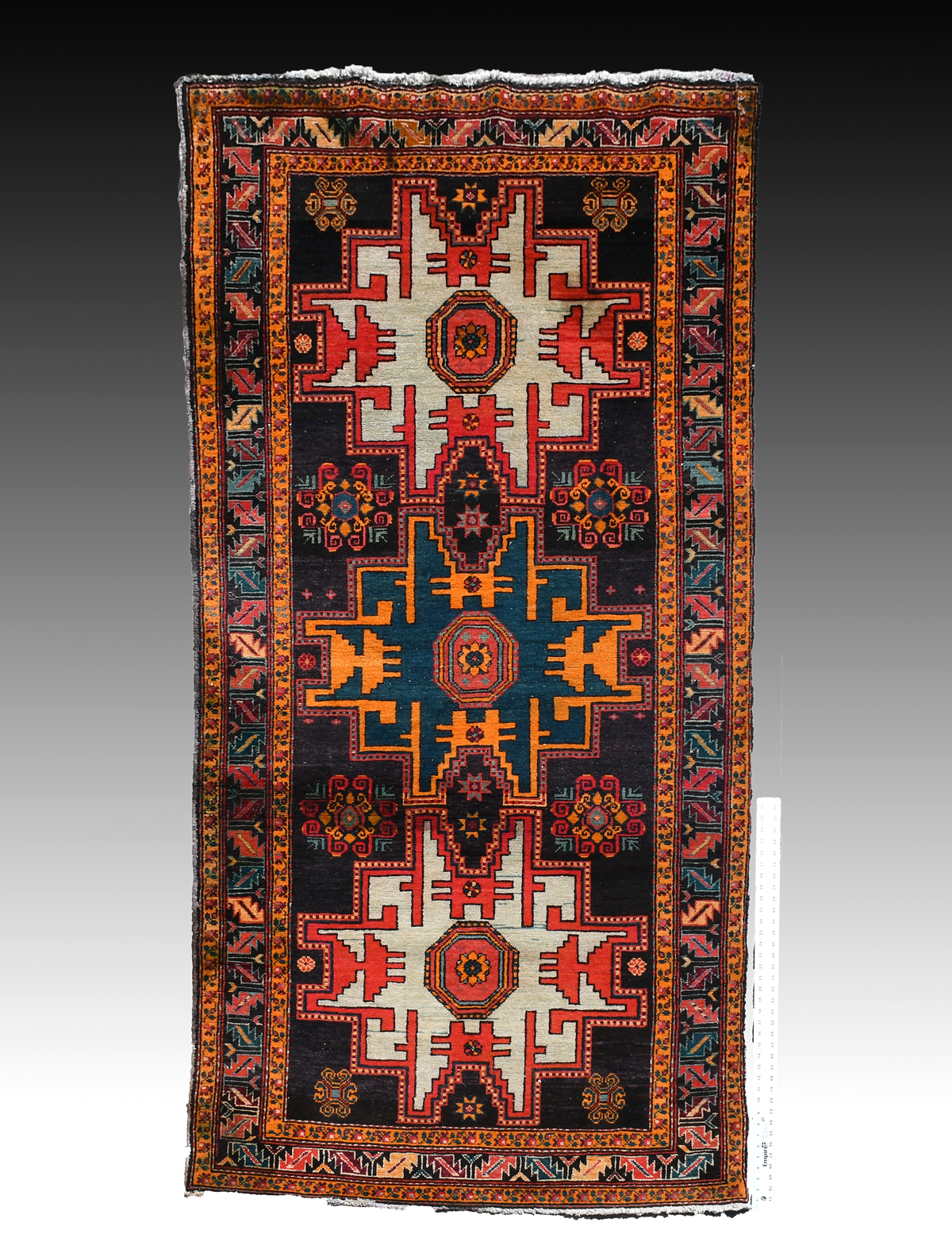 Appraisal: KURDISH-CAUCASIAN HAND KNOTTED WOOL RUG ' '' X ' This