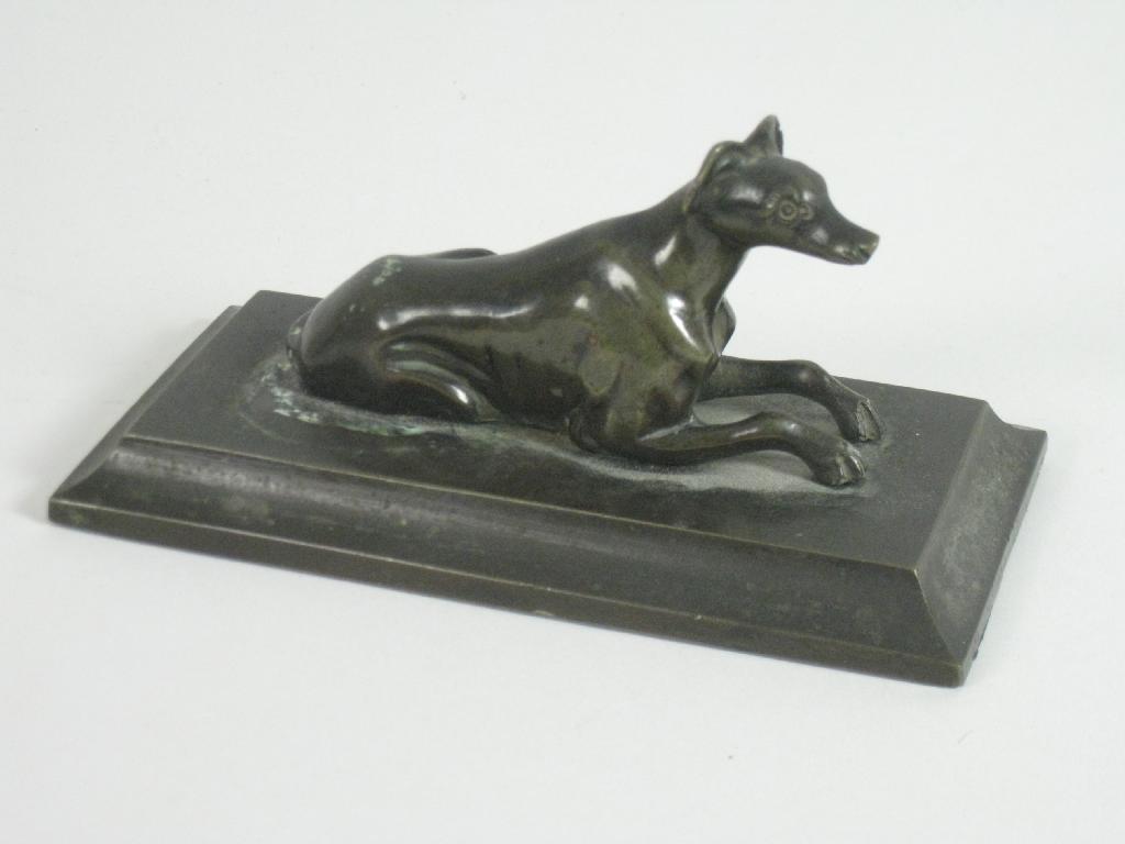 Appraisal: A small bronze Figure of reclining Whippet on rectangular base