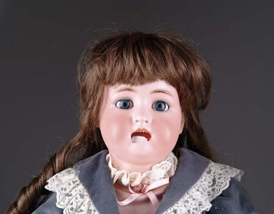 Appraisal: K R OPEN MOUTH GERMAN DOLL Blue glass sleep eyes