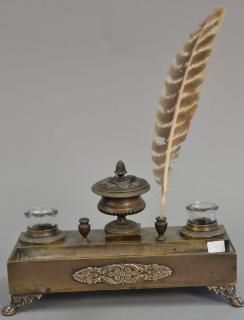 Appraisal: Victorian bronze double inkwell with pen holders and tray on