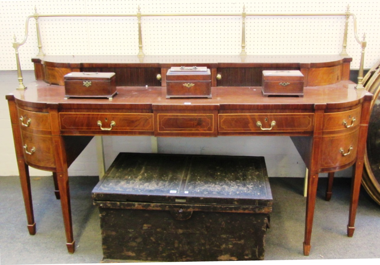 Appraisal: A th century Scottish inlaid mahogany bowfront sideboard with brass