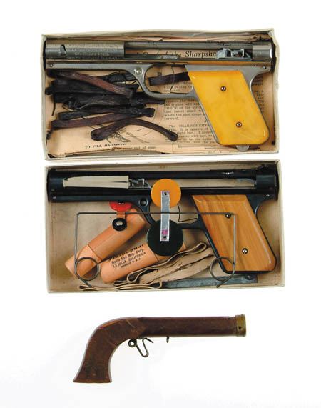 Appraisal: LOT OF THREE EARLY TOY PISTOLS A cork or dart