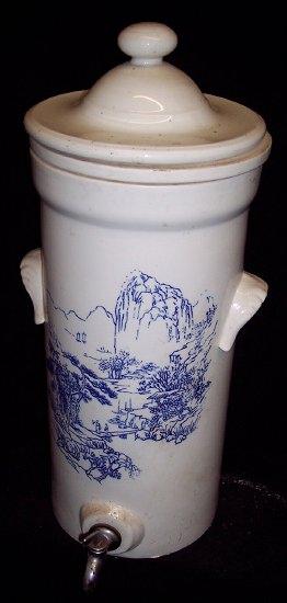 Appraisal: A water filter with printed Oriental decoration cm high