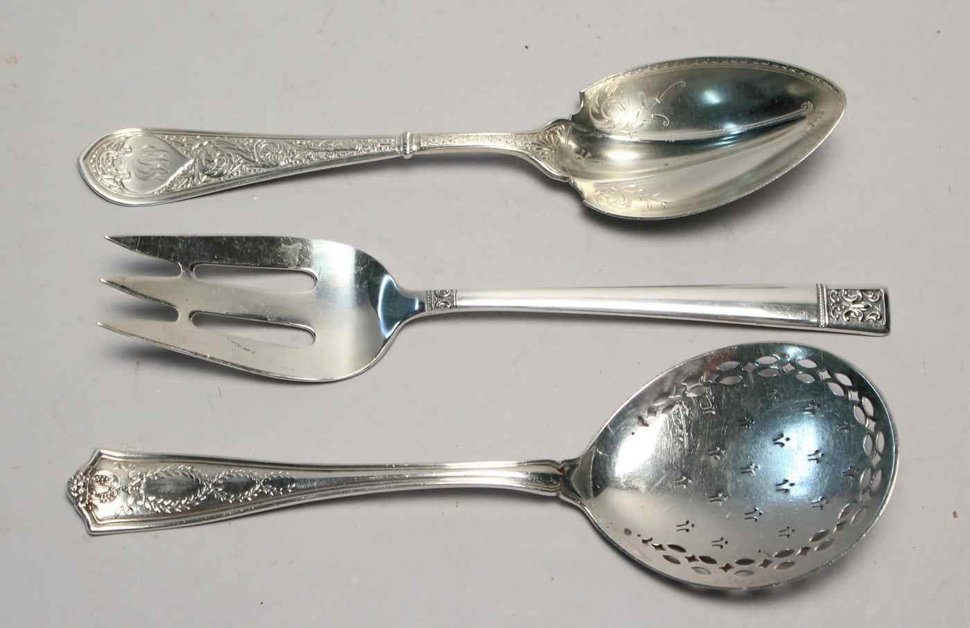 Appraisal: THREE STERLING SILVER SERVING PIECESA cold meat fork by Towle