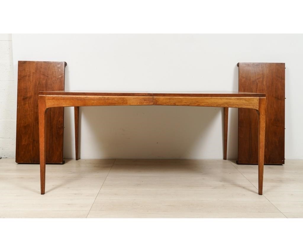 Appraisal: Mid-century modern Danish style teak dining table with two extra