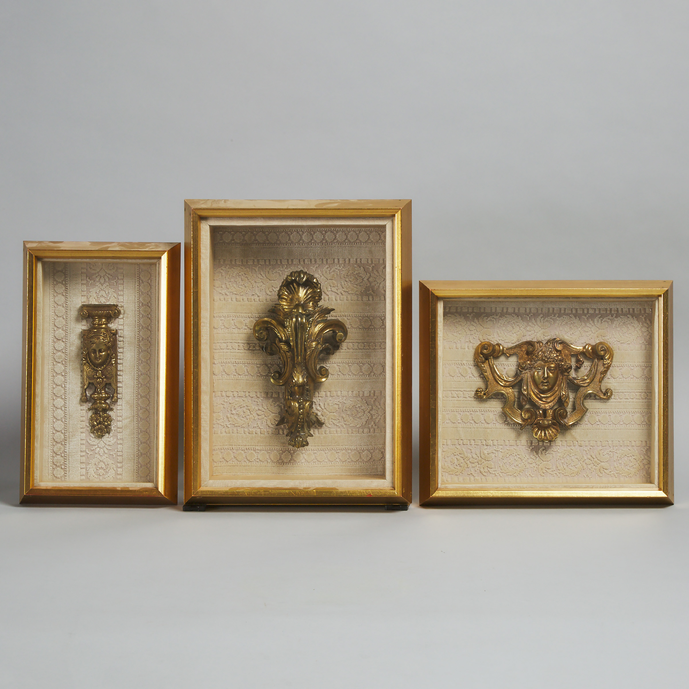 Appraisal: Three French Ormolu Furniture Mounts th century each now framed