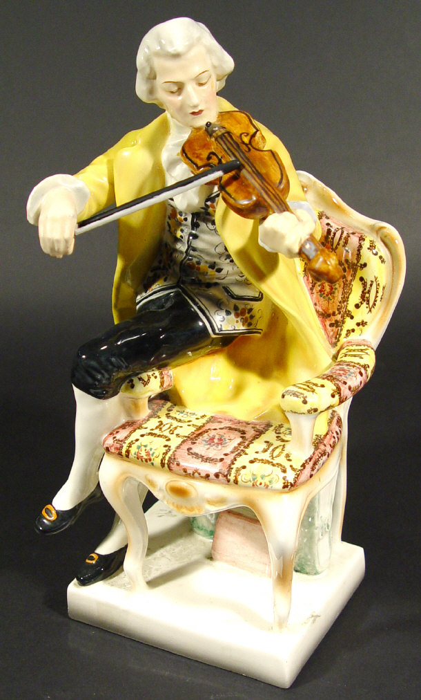 Appraisal: Goldschneider violinist seated on an open armchair with hand painted