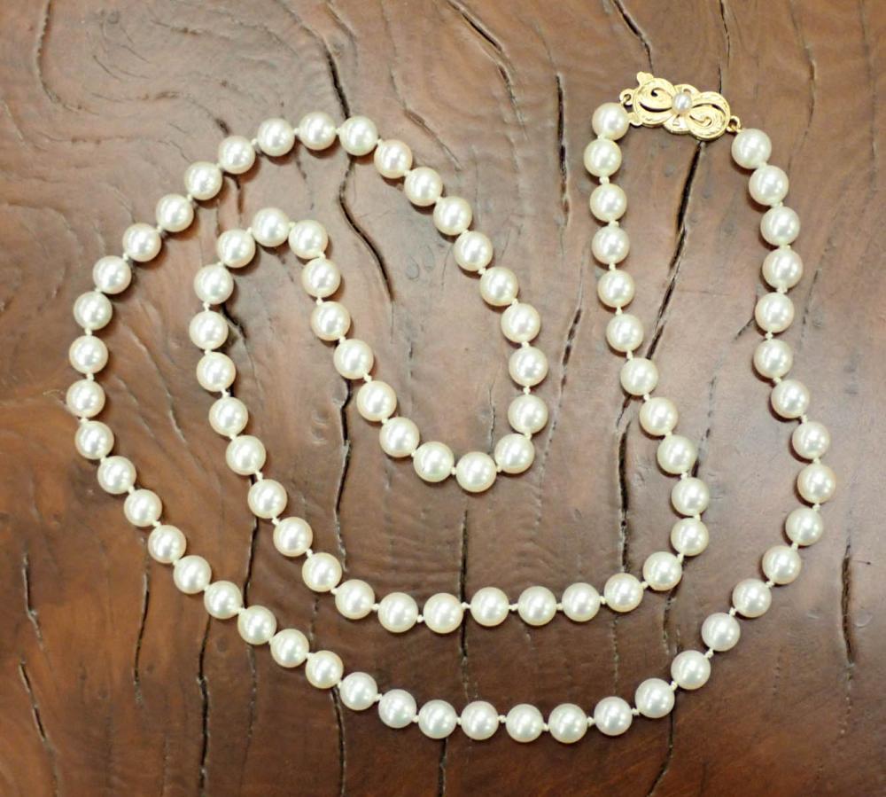 Appraisal: MIKIMOTO AKOYA PEARL AND EIGHTEEN KARAT GOLD NECKLACE hand-knotted strand