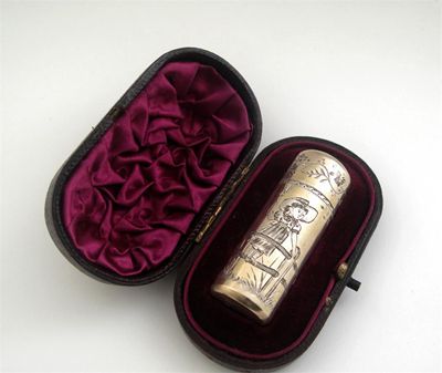 Appraisal: A Victorian parcelgilt scent plain tubular with engraved decoration after