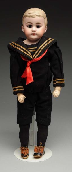 Appraisal: Splendid German Bisque Boy Doll So-called American Schoolboy shoulder head