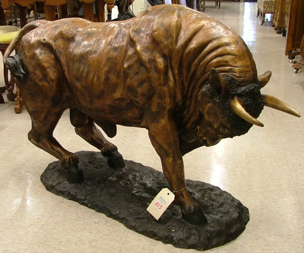 Appraisal: LARGE BRONZE WILDLIFE FLOOR SCULPTURE the figure of a charging