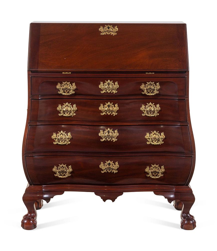 Appraisal: A Chippendale Style Carved Mahogany Bombe-Form Slant-Front Desk A Chippendale