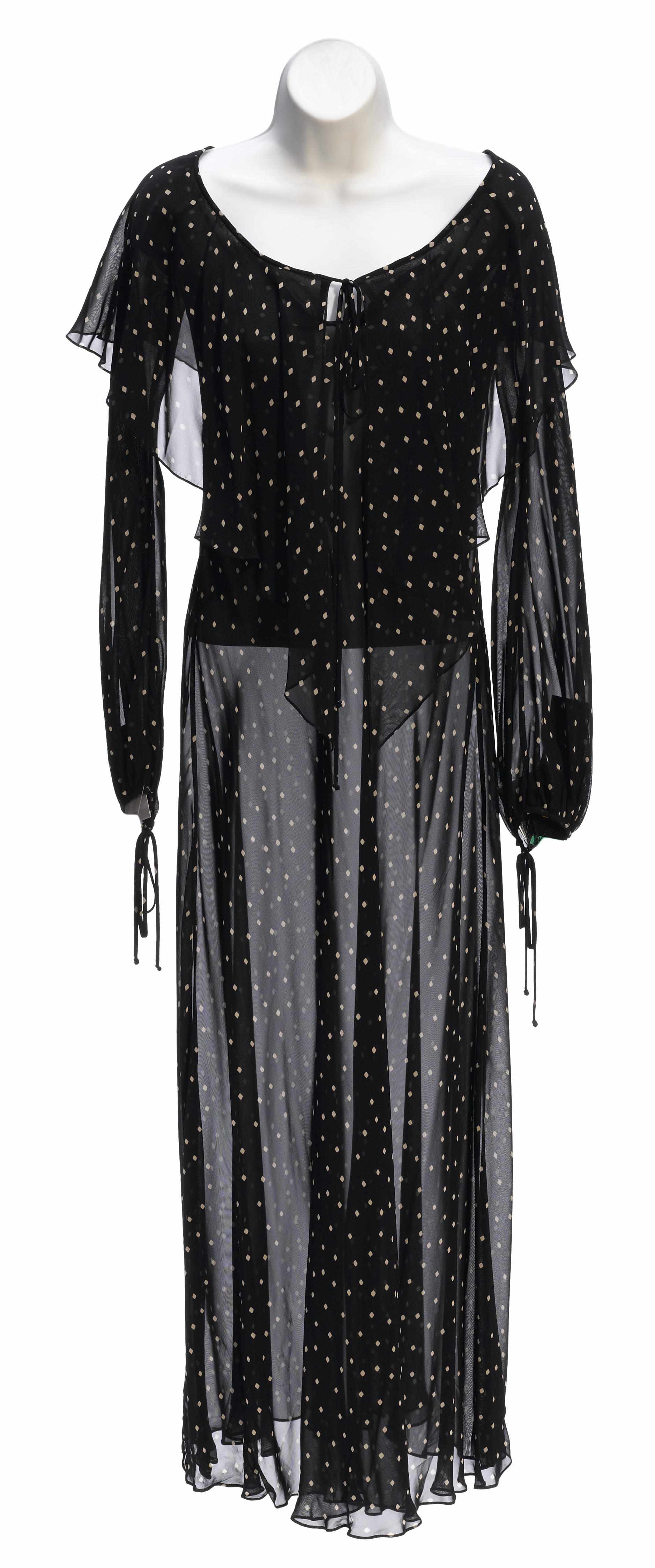 Appraisal: A Donna Karan sheer navy polka dot dress size together