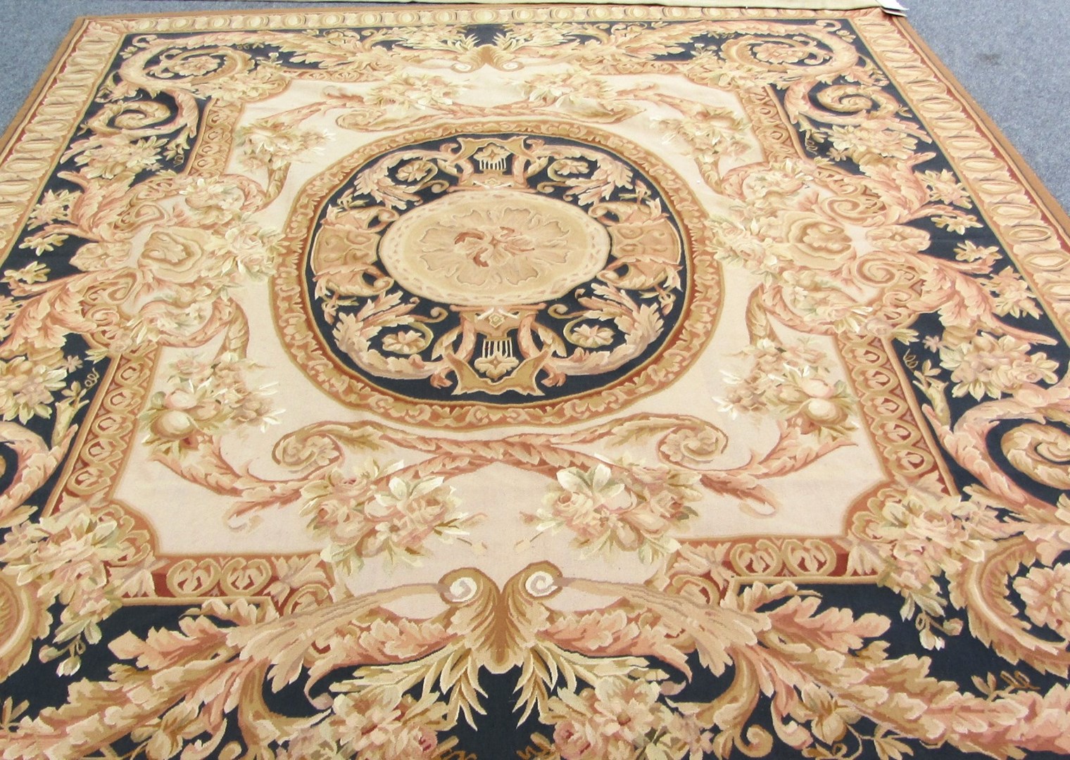 Appraisal: An Aubusson style tapestry carpet the beige field with a